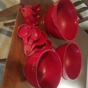 Red KitchenAid Mixing Bowls and Measuring Items